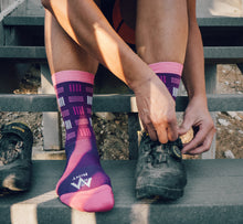 Load image into Gallery viewer, Purpel socks getting ready to ride
