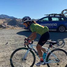 Load image into Gallery viewer, cyclist rides gravel with Shimano neutral support.